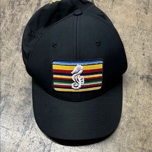 Black Pukka Hat with Chileno Bay logo. Good condition